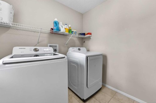 52 Reunion Close Nw, Airdrie, AB - Indoor Photo Showing Laundry Room