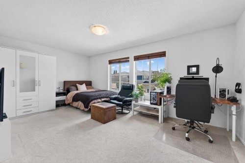 52 Reunion Close Nw, Airdrie, AB - Indoor Photo Showing Bedroom