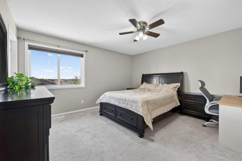 52 Reunion Close Nw, Airdrie, AB - Indoor Photo Showing Bedroom
