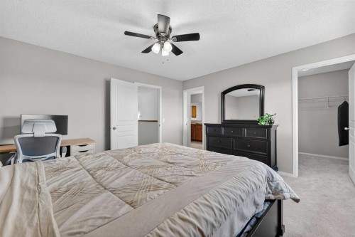 52 Reunion Close Nw, Airdrie, AB - Indoor Photo Showing Bedroom