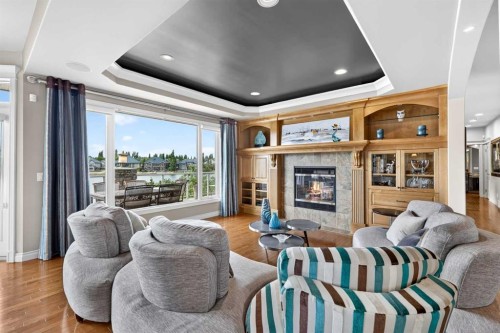 128 Heritage Lake Drive, Heritage Pointe, AB - Indoor Photo Showing Living Room With Fireplace