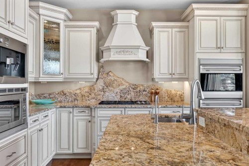 128 Heritage Lake Drive, Heritage Pointe, AB - Indoor Photo Showing Kitchen With Double Sink With Upgraded Kitchen