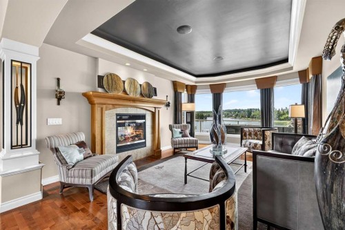 128 Heritage Lake Drive, Heritage Pointe, AB - Indoor Photo Showing Living Room With Fireplace