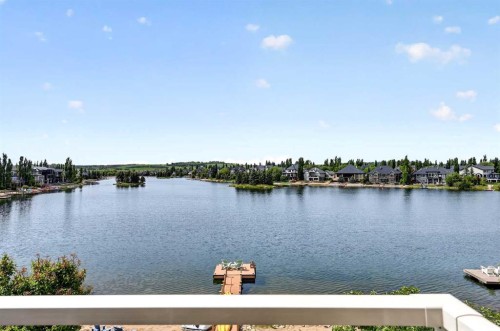128 Heritage Lake Drive, Heritage Pointe, AB - Outdoor With Body Of Water With View