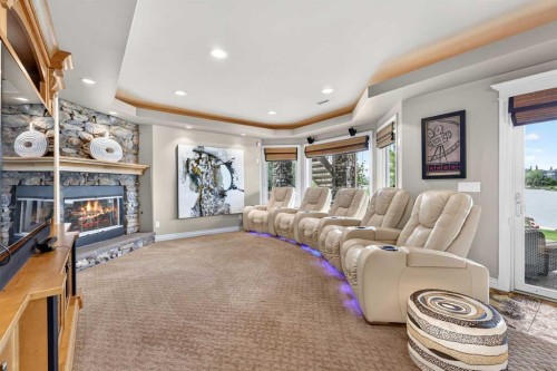 128 Heritage Lake Drive, Heritage Pointe, AB - Indoor Photo Showing Living Room With Fireplace