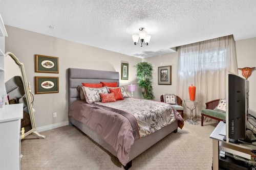 128 Heritage Lake Drive, Heritage Pointe, AB - Indoor Photo Showing Bedroom