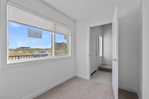 132 Quesnay Wood Link Sw, Calgary, AB 