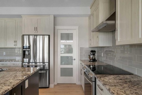 347 Hillcrest Heights Sw, Airdrie, AB - Indoor Photo Showing Kitchen With Upgraded Kitchen
