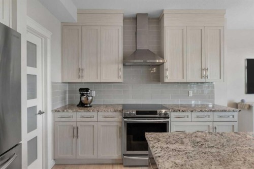 347 Hillcrest Heights Sw, Airdrie, AB - Indoor Photo Showing Kitchen With Upgraded Kitchen