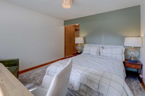 3419 Morley Trail Nw, Calgary, AB - Indoor Photo Showing Bedroom