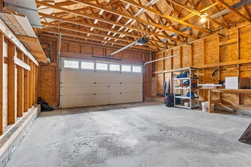25 Panamount Green Nw, Calgary, AB - Indoor Photo Showing Garage