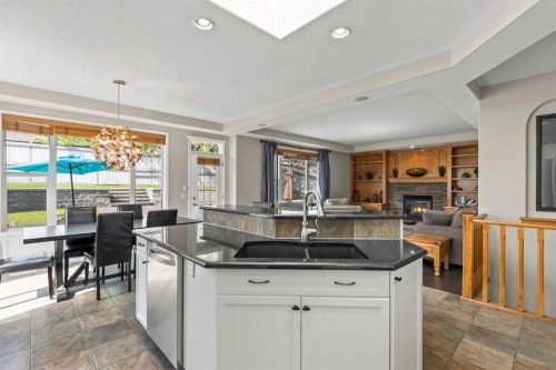 25 Panamount Green Nw, Calgary, AB - Indoor Photo Showing Kitchen With Double Sink