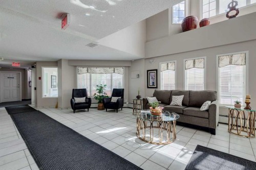 1213-1213 Sienna Park Green Sw, Calgary, AB - Indoor Photo Showing Living Room