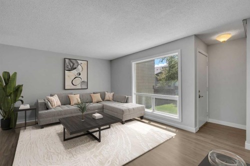 13-7205 4 Street Ne, Calgary, AB - Indoor Photo Showing Living Room