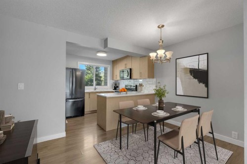 13-7205 4 Street Ne, Calgary, AB - Indoor Photo Showing Dining Room