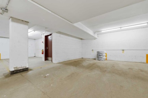 102-611 67 Avenue Sw, Calgary, AB - Indoor Photo Showing Garage