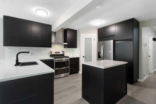 40 Mt Assiniboine Circle Se, Calgary, AB - Indoor Photo Showing Kitchen With Stainless Steel Kitchen With Upgraded Kitchen