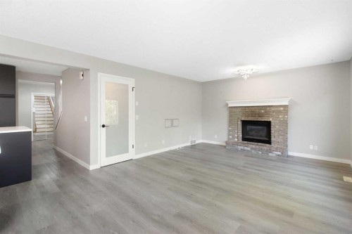 40 Mt Assiniboine Circle Se, Calgary, AB - Indoor Photo Showing Living Room With Fireplace
