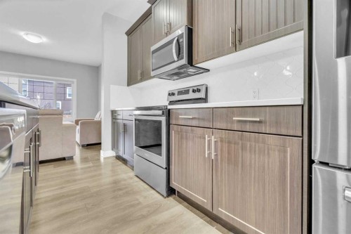 52 Red Embers Manor Ne, Calgary, AB - Indoor Photo Showing Kitchen