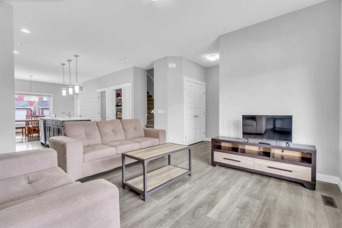 52 Red Embers Manor Ne, Calgary, AB - Indoor Photo Showing Living Room