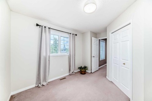 409 Rocky Ridge Bay Nw, Calgary, AB 