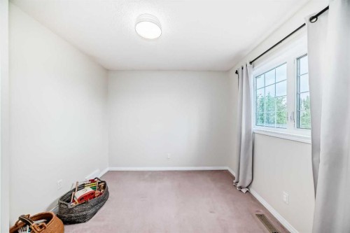 409 Rocky Ridge Bay Nw, Calgary, AB 