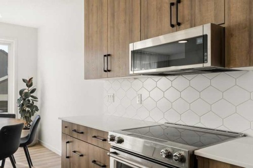 20 Wolf Creek Street Se, Calgary, AB - Indoor Photo Showing Kitchen