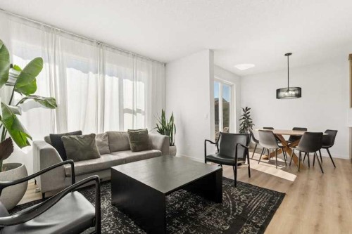 20 Wolf Creek Street Se, Calgary, AB - Indoor Photo Showing Living Room