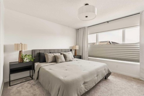 20 Wolf Creek Street Se, Calgary, AB - Indoor Photo Showing Bedroom