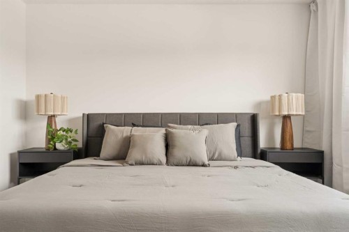 20 Wolf Creek Street Se, Calgary, AB - Indoor Photo Showing Bedroom