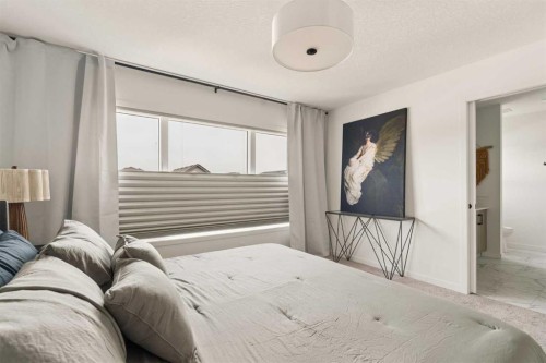 20 Wolf Creek Street Se, Calgary, AB - Indoor Photo Showing Bedroom