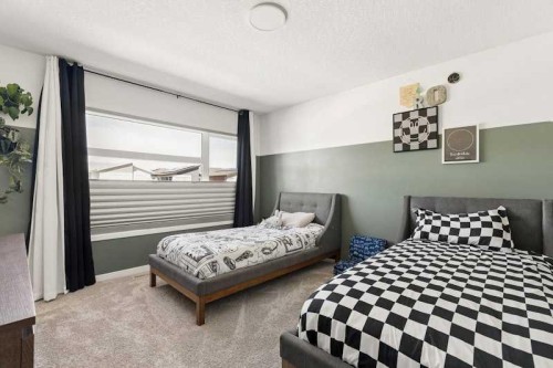 20 Wolf Creek Street Se, Calgary, AB - Indoor Photo Showing Bedroom