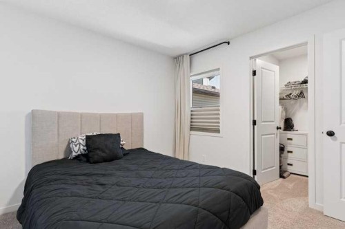 20 Wolf Creek Street Se, Calgary, AB - Indoor Photo Showing Bedroom