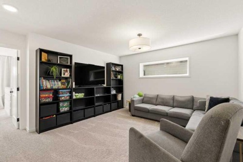 20 Wolf Creek Street Se, Calgary, AB - Indoor Photo Showing Living Room