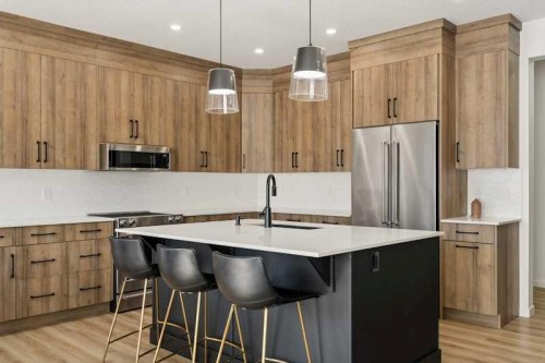 20 Wolf Creek Street Se, Calgary, AB - Indoor Photo Showing Kitchen With Upgraded Kitchen