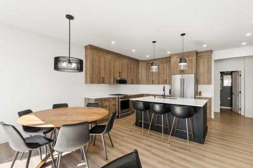 20 Wolf Creek Street Se, Calgary, AB - Indoor Photo Showing Dining Room