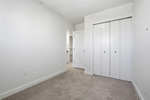 58 Taraglen Road Ne, Calgary, AB - Indoor Photo Showing Other Room
