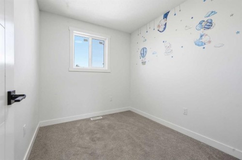 58 Taraglen Road Ne, Calgary, AB - Indoor Photo Showing Other Room
