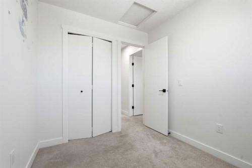 58 Taraglen Road Ne, Calgary, AB - Indoor Photo Showing Other Room