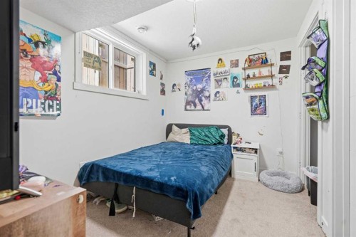58 Taraglen Road Ne, Calgary, AB - Indoor Photo Showing Bedroom
