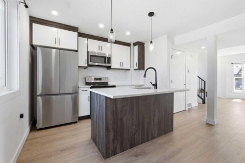 58 Taraglen Road Ne, Calgary, AB - Indoor Photo Showing Kitchen With Stainless Steel Kitchen With Upgraded Kitchen