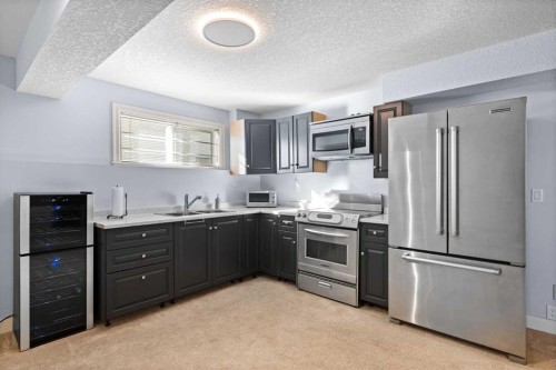 366 Patterson Boulevard Sw, Calgary, AB - Indoor Photo Showing Kitchen With Double Sink