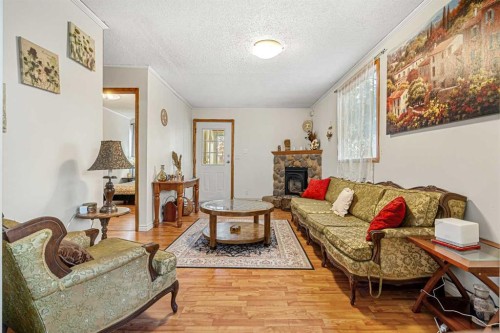 1616 3 Street Nw, Calgary, AB - Indoor Photo Showing Living Room With Fireplace