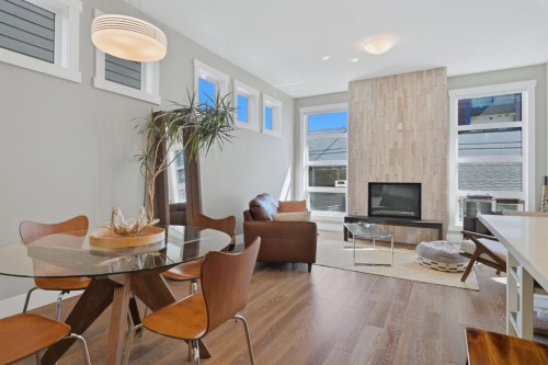 2-4620 17 Avenue Nw, Calgary, AB - Indoor With Fireplace
