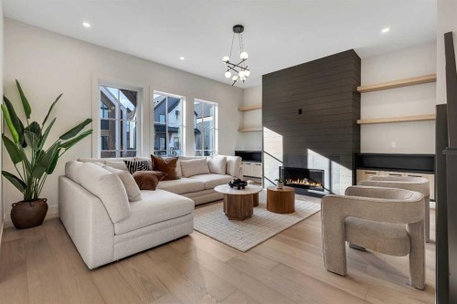 342 Normandy Drive Sw, Calgary, AB - Indoor Photo Showing Living Room