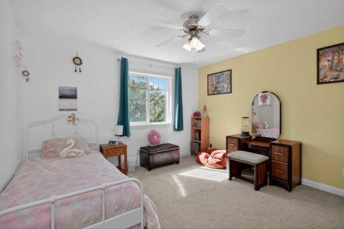 90 Sage Hill Way Nw, Calgary, AB - Indoor Photo Showing Bedroom