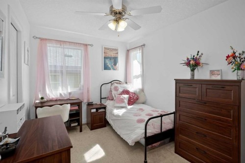 90 Sage Hill Way Nw, Calgary, AB - Indoor Photo Showing Bedroom