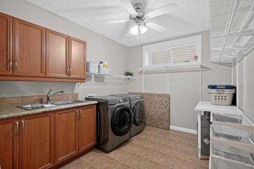 90 Sage Hill Way Nw, Calgary, AB - Indoor Photo Showing Laundry Room