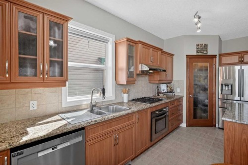 90 Sage Hill Way Nw, Calgary, AB - Indoor Photo Showing Kitchen With Double Sink With Upgraded Kitchen