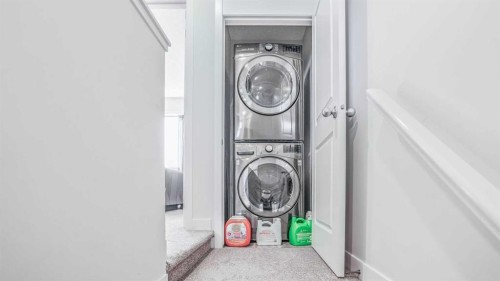 100 Carringvue Way Nw, Calgary, AB - Indoor Photo Showing Laundry Room
